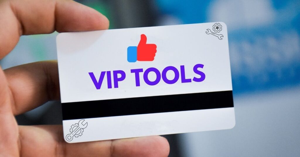 A person holding a card with the text "VIP TOOLS" prominently displayed in bold purple letters, along with a thumbs-up icon and mechanical tool symbols, representing the powerful TikTok automation tool VIPTools for boosting followers, likes, and views easily.